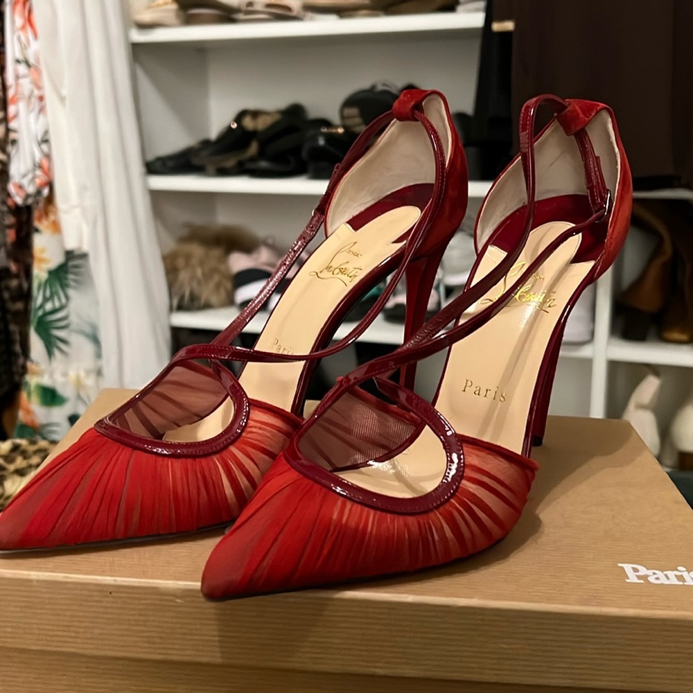 Red Louboutin high heels in perfect condition